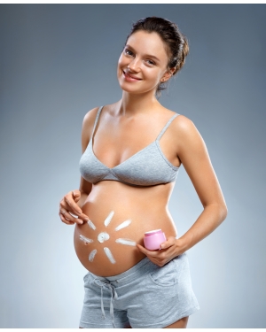 Pregnancy Safe Sunscreen on Pregnant Woman